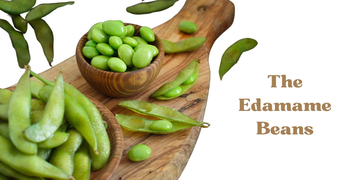Edamame beans on a serving platter some are in the pod and some are out of the pod